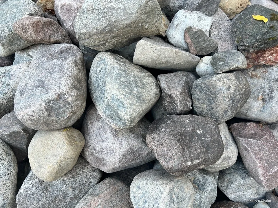 Close view of varied natural stones on the chalet grounds