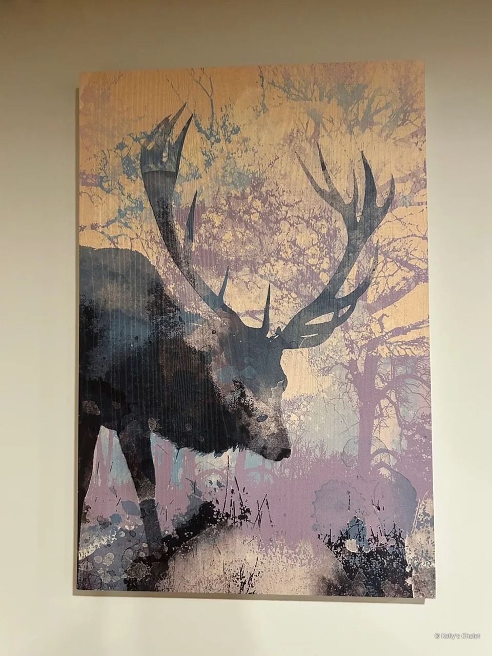 Colourful deer artwork in the chalet’s main bedroom